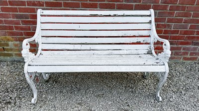 Lot 1530 - A garden bench with cast iron ends