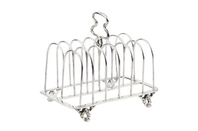 Lot 625 - An early Victorian silver seven bar toast rack,...