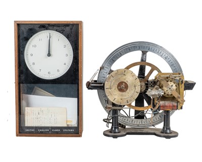 Lot 1185 - A Smiths master clock with a slave mechanism