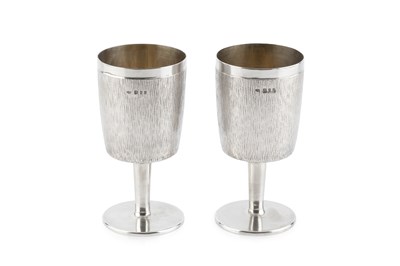 Lot A pair of silver goblets, of textured,...