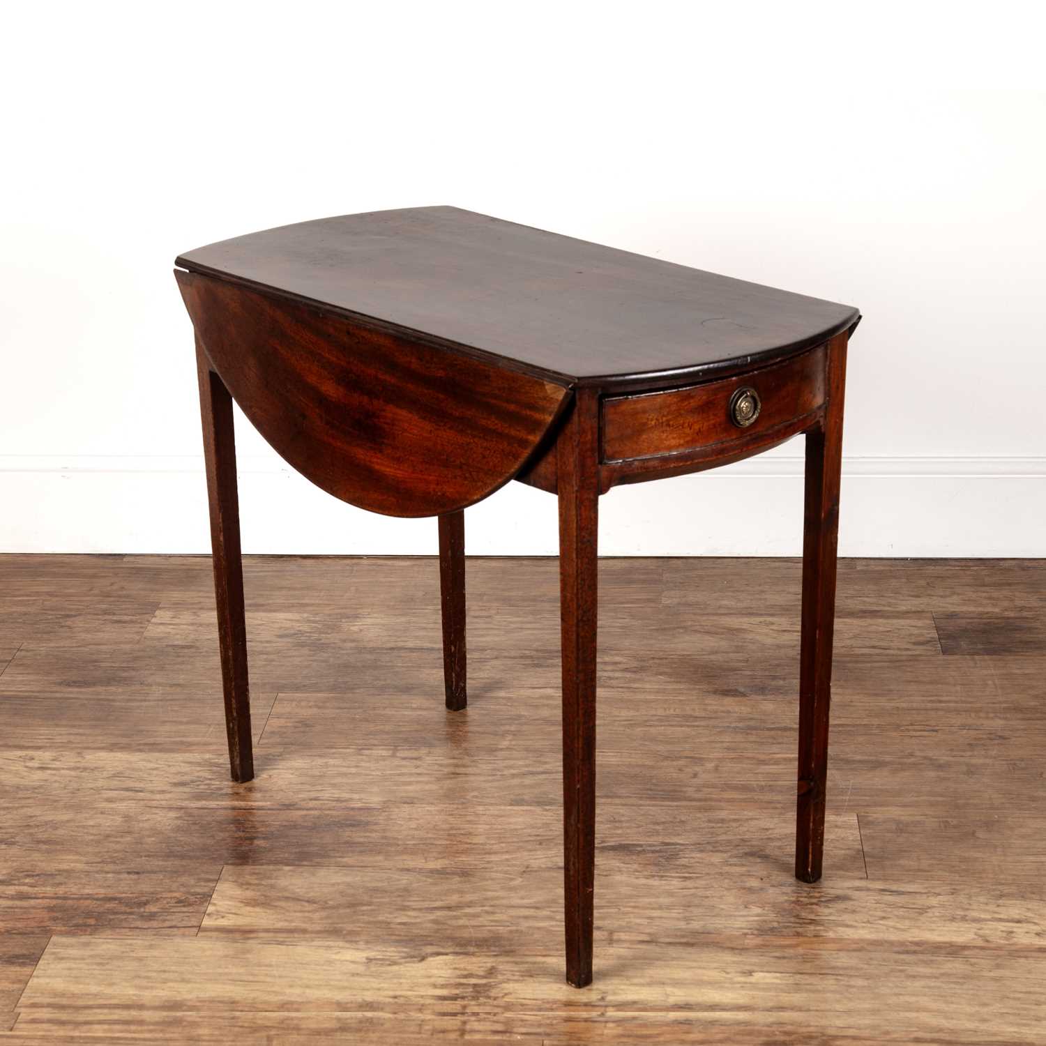 Lot 51 - Mahogany circular drop-leaf pembroke table...