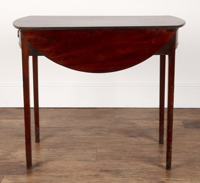 Lot 51 - Mahogany circular drop-leaf pembroke table...