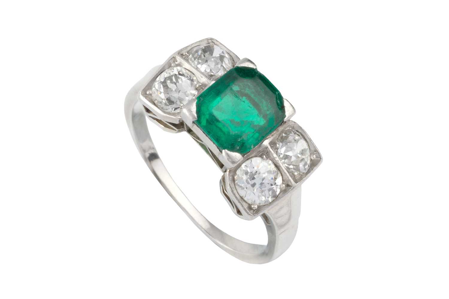 Lot 56 - An emerald and diamond dress ring, the...