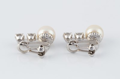 Lot 54 - A pair of cultured pearl and diamond ear clips,...