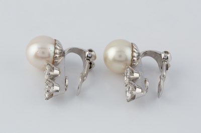 Lot 54 - A pair of cultured pearl and diamond ear clips,...