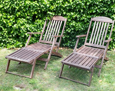 Lot 1442A - A pair of teak reclining folding armchairs