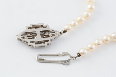 Lot 53 - A cultured pearl necklace with diamond set...