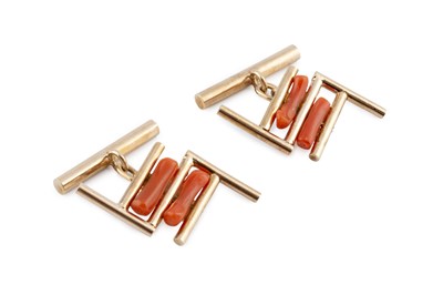 Lot 76 - A pair of coral set cufflinks, of geometric...