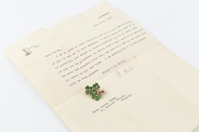 Lot 36 - An early 20th century enamel and seed pearl...