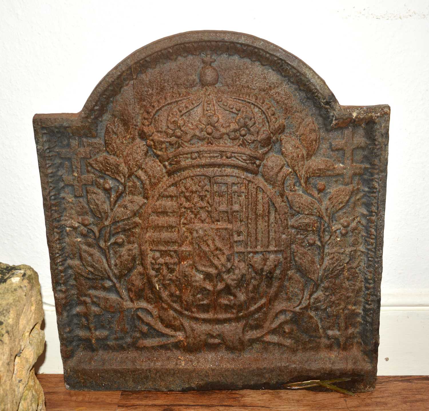 Lot 10 - Cast iron fireback with a coat of arms, 67cm...