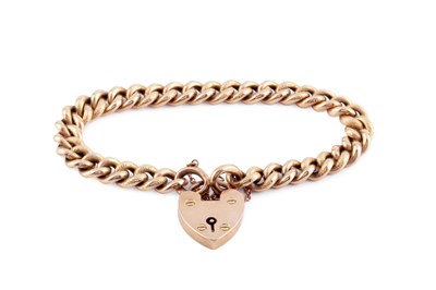 Lot 78 - A curb-link bracelet, of hollow part-textured...