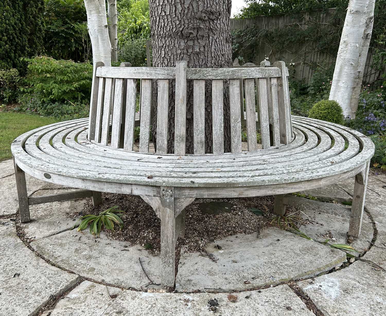 Lot A teak circular tree seat
