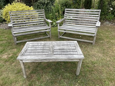 Lot 1276 - A suite of teak patio furniture