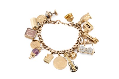Lot 81 - A charm bracelet, the curb-link bracelet...