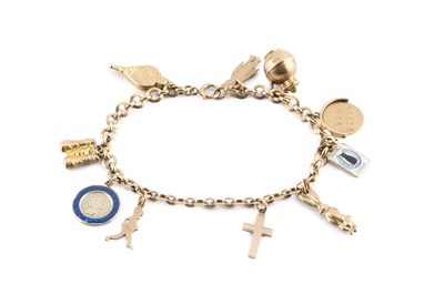 Lot 87 - A charm bracelet, the fancy-link bracelet with...