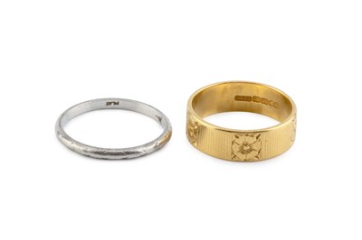 Lot 12 - A 22ct gold wedding band, with floral engraved...