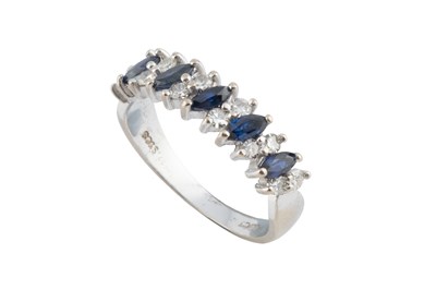Lot 64 - A sapphire and diamond half hoop ring,...