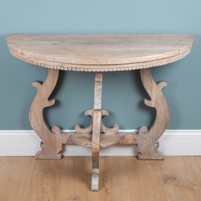 Lot 1072 - A demi-lune OKA hardwood console table