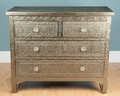 Lot 1031 - A metal-finished chest of drawers by Graham & Green