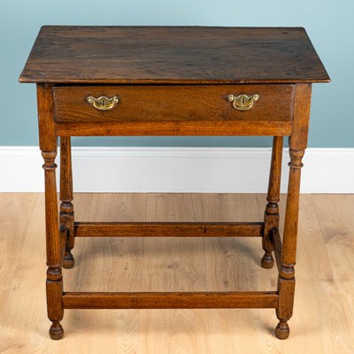 Lot 257 - A country made oak and ash side table