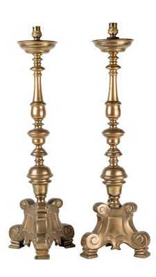 Lot 165 - A pair of 17th century bronze ecclesiastical candlesticks