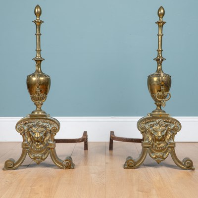 Lot 1157 - A pair of 18th century-style brass and wrought iron fire dogs