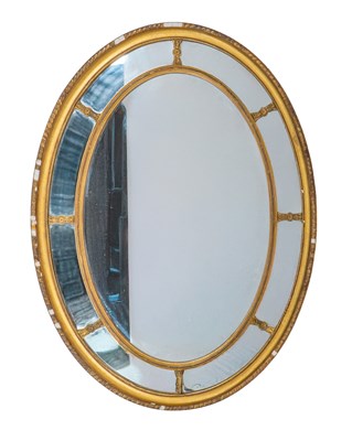 Lot 1205 - A 19th century oval gilt wall mirror