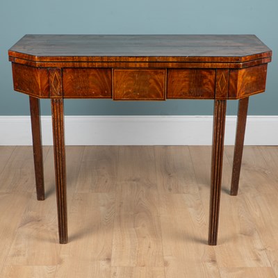 Lot 283 - A George III mahogany tea table