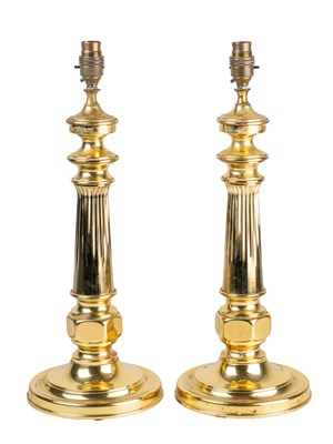 Lot 371 - A pair of brass table lamps