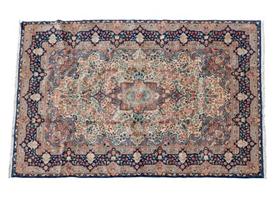 Lot 1135 - A mid-20th century hand-woven Kerman rug