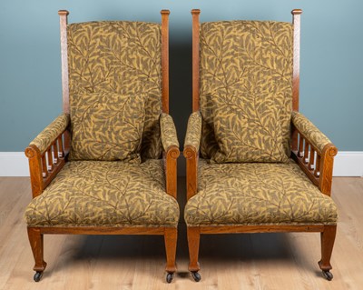 Lot 1088 - A pair of late 19th Century oak-framed armchairs