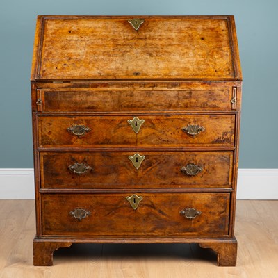 Lot 351 - A late George II walnut bureau
