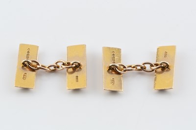 Lot 8 - A pair of 9ct gold cufflinks, each with engine-...