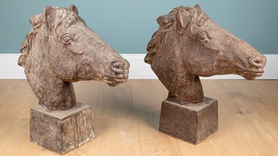 Lot 1370 - A pair of horse head statues
