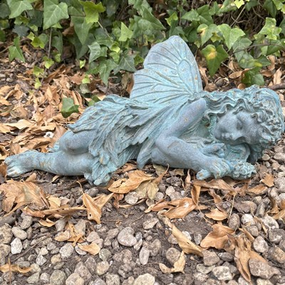 Lot 1280 - A bronze statuette of a sleeping fairy