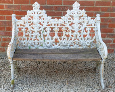 Lot 1301 - A cast iron garden bench