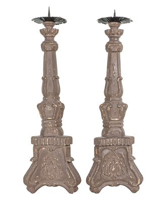 Lot 284 - A pair of grey-painted carved wood pricket candlesticks
