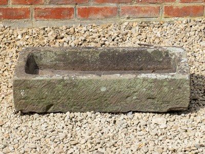 Lot 1378 - A carved limestone trough