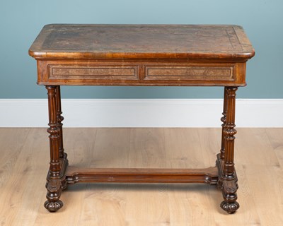 Lot 240 - An early Victorian walnut writing table