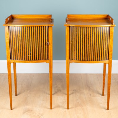 Lot 148 - A pair of 19th century satinwood bow-fronted bedside cabinets
