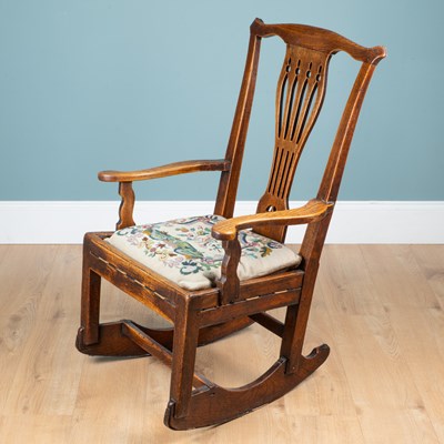 Lot 1034 - A late 18th century Welsh ash rocking chair