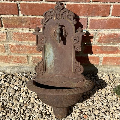 Lot 1376 - A small cast iron wall fountain