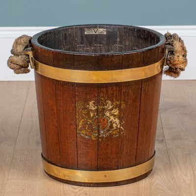 Lot 250 - A mid-20th century mahogany and brass naval bucket