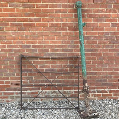 Lot 1350 - A wrought iron gate and gatepost