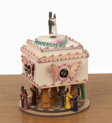 Lot 389 - Eleanor Glover (b.1952) Wedding cake music box,...
