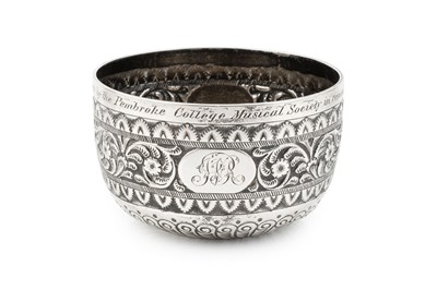 Lot 642 - A late Victorian silver sugar bowl, embossed...