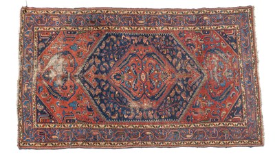 Lot 1172 - An early 20th century hand-woven Heriz village carpet