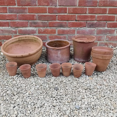 Lot 1296 - A collection of seventeen terracotta pots