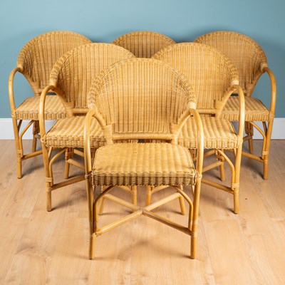 Lot 1364 - A set of six Heals rattan dining chairs