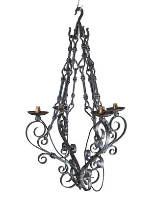 Lot 1144 - A pair of wrought iron four-branch chandeliers